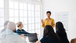 A project management specialist meets with the project team.